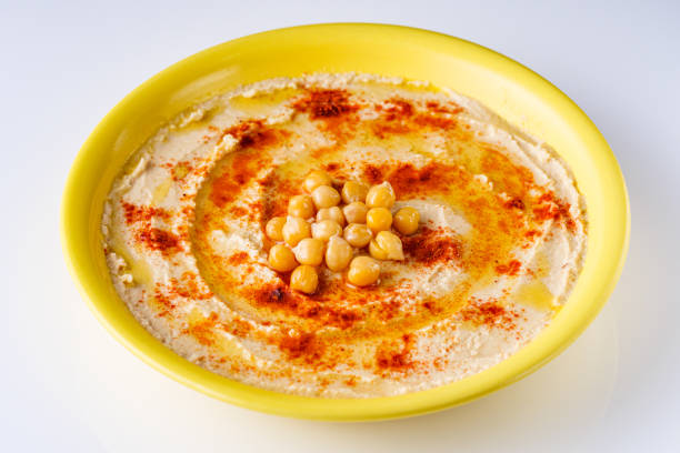 istock traditional turkish hummus on a white acrylic background 1295609352