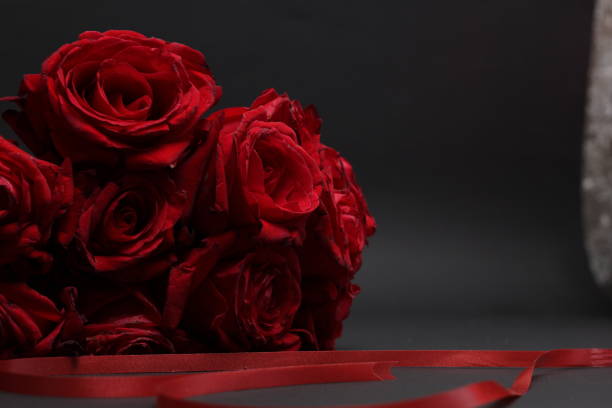 istock Red roses Valentines Day background. Flowers composition 1295609357