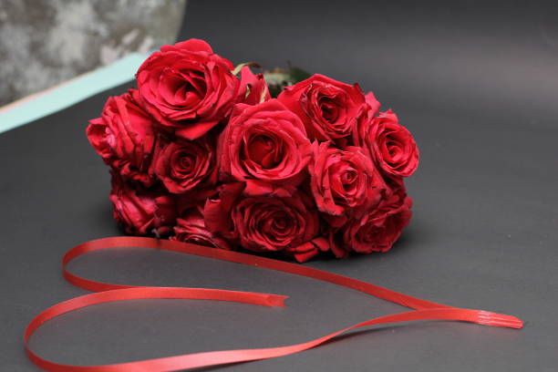 istock Red roses Valentines Day background. Flowers composition 1295609365