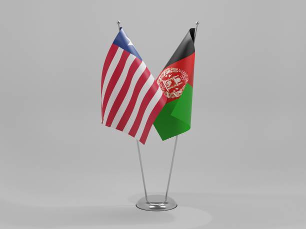 istock Afghanistan - Liberia Cooperation Flags, White Background - 3D Render 1295609540