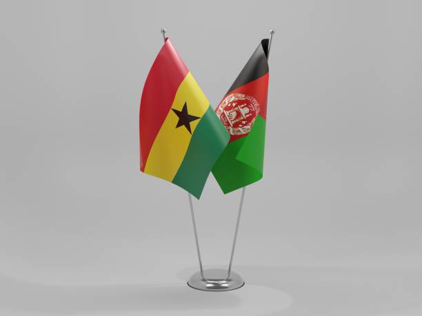 istock Afghanistan - Ghana Cooperation Flags, White Background - 3D Render 1295610242