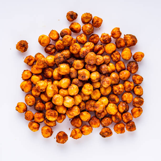 istock fried chickpeas on a white acrylic background 1295610275