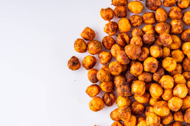 istock fried chickpeas on a white acrylic background 1295610296