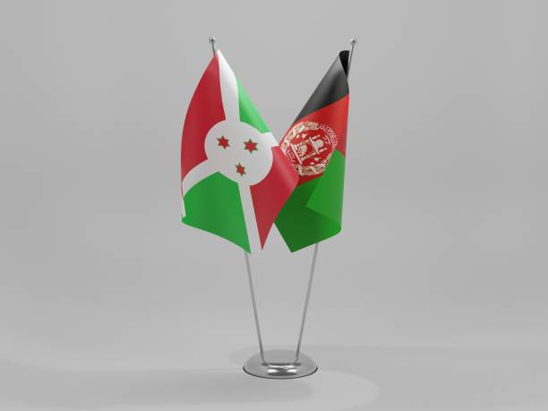 istock Afghanistan - Burundi Cooperation Flags, White Background - 3D Render 1295610681