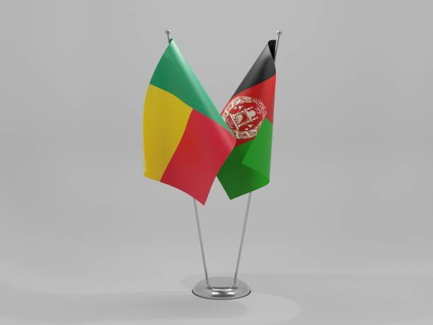istock Afghanistan - Benin Cooperation Flags, White Background - 3D Render 1295610786