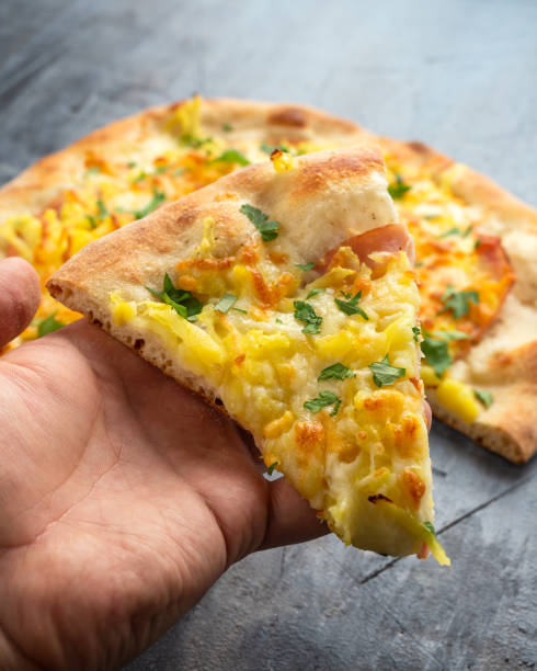 istock Homemade Potato, Ham Pizza with Mozzarella Cheese 1295610839