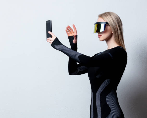 istock android female in VR glasses and mobile phone on white background. 1295610892