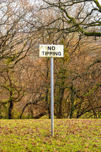 istock No tipping sign on a grass verge 1295612861