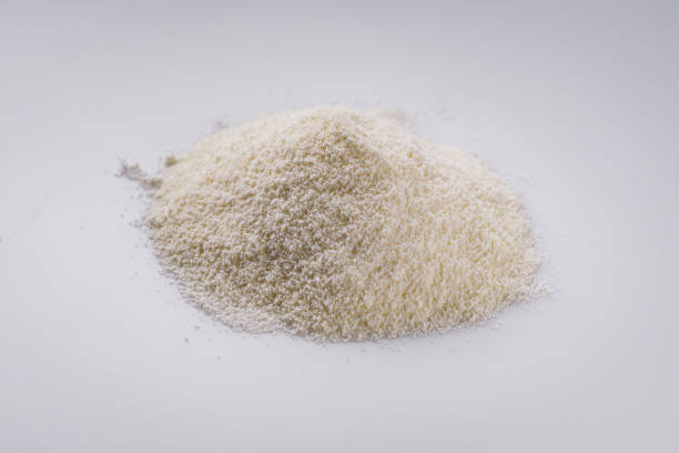 istock granulated milk powder on a white acrylic background 1295617293