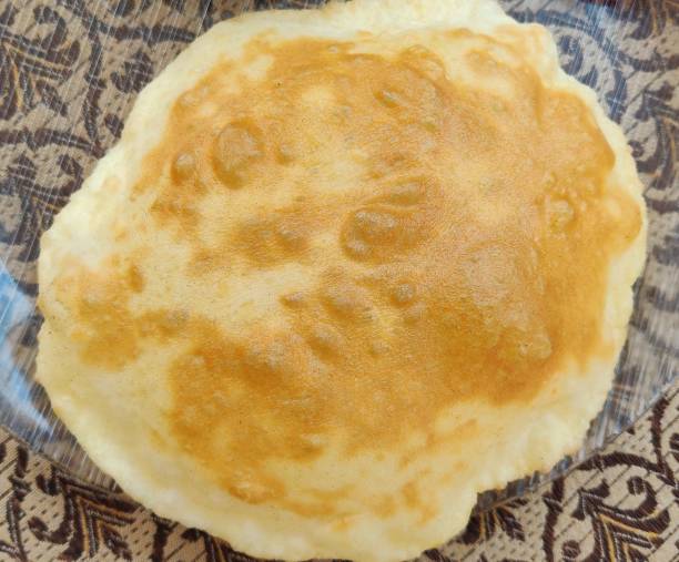 istock Indian deep fried flour Chapati or Puri or Bhatura 1295630373