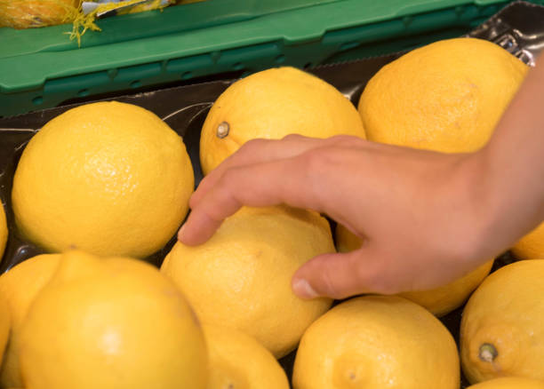istock ripe grapefruits in a box at the supermarket 1295631696