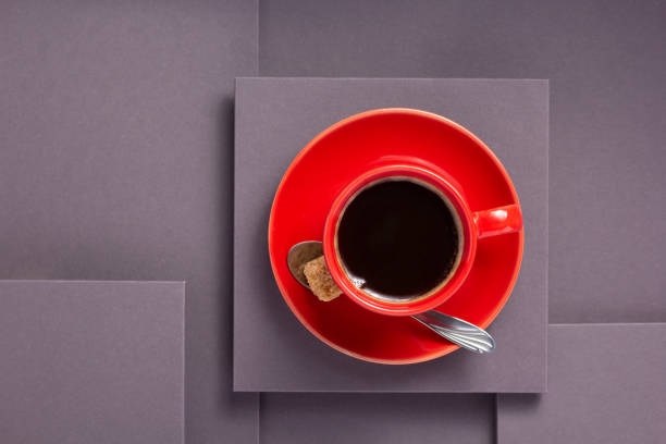 cup of coffee at abstract background, on paper surface texture top view lay flat concept