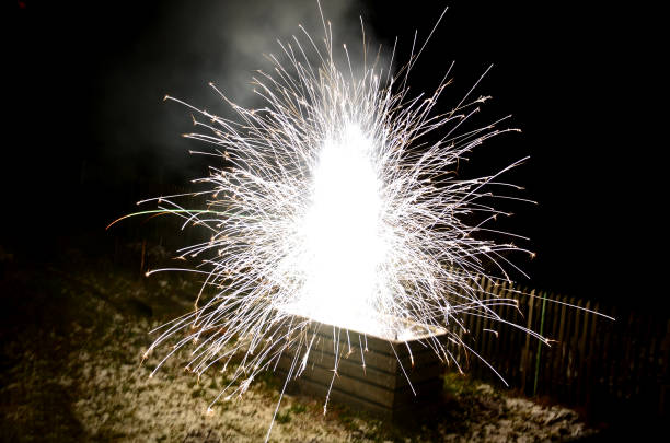 background, black, bomb, box, bright, bullets, burning, cassette, celebration, circle, cluster, container, contraband, crate, danger, dangerous, dark, defuse, destroy, destruction, effect, explosion, explosive, fire, fireball, flame, flash, fountain, fun, hot, illegal, light, new, night, paper, party, police, pyrotechnic, pyrotechnics, safety, shape, shards, shipping, shoot, shooting, shrub, snow, storage, white, year