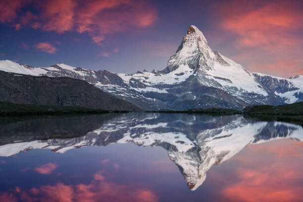 Matterhorn sunrise Matterhorn, Switzerland, Zermatt, Mountain, Sunset reflection lake stock pictures, royalty-free photos & images