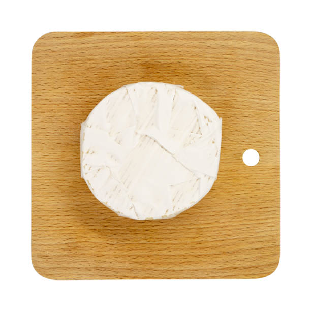 istock Brie or camambert cheese on a board. On a white background 1295642984