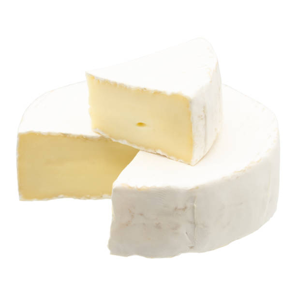 istock Camembert or brie cheese isolated on white background. Soft cheese covered with edible white mold view from above. 1295642987