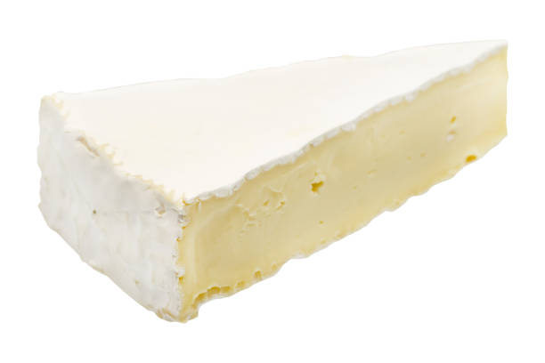 istock Brie or camambert cheese isolated on white background. Soft cheese covered with edible white mold view from above. 1295643008