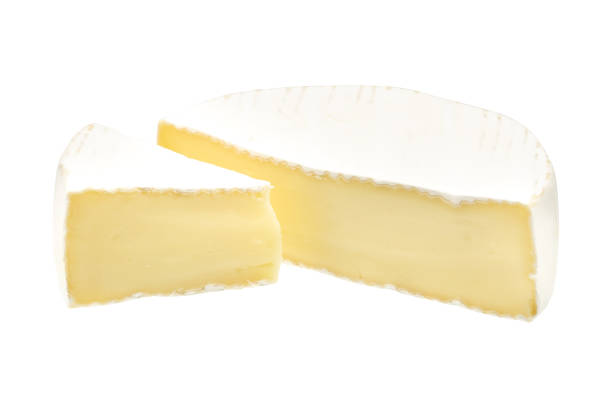 istock Camembert or brie cheese isolated on white background. Soft cheese covered with edible white mold view from above. 1295643009