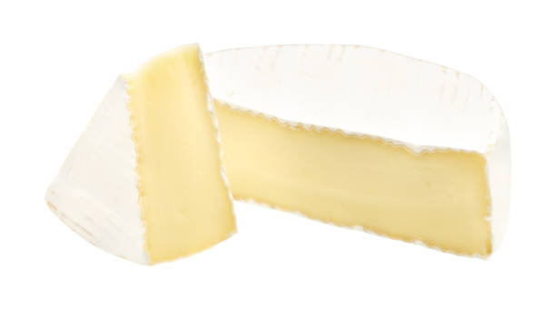 istock Camembert or brie cheese isolated on white background. Soft cheese covered with edible white mold view from above. 1295643137