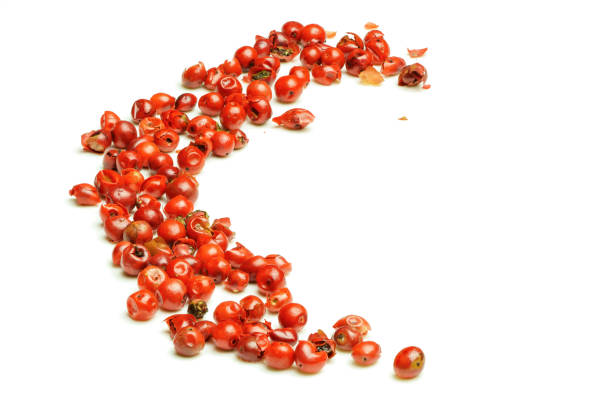 macro close up of mixed pink pepper berries - pink pepper imagens e fotografias de stock