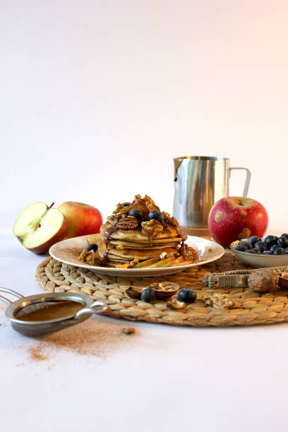 Apfelpfannkuchen Pancakes with apple apple cinnamon pancake stock pictures, royalty-free photos & images