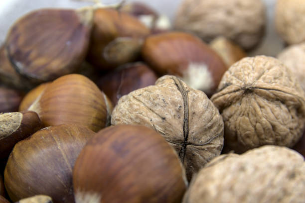 In the foreground the chestnuts and walnuts, typical fruit of the Christmas period