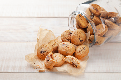 Chocolate cookies in glass jar, butter delicacies