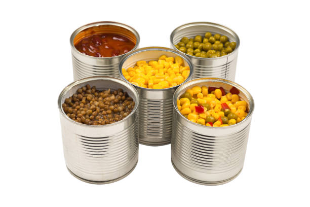 istock Canned food on white background. Green pea, beans, corn, lentils. 1295649141