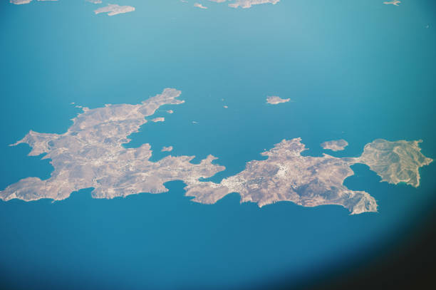Aerial view over Patmos island, Greece. Patmos is a small Greek island in the Aegean Sea. It is perhaps best known today as the location the disciple / apostle John received the visions found in the Book of Revelation of the New Testament, and where the book was written.