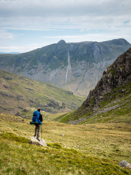 istock Hiker looking at distant mountains in the Lake District 1295651607