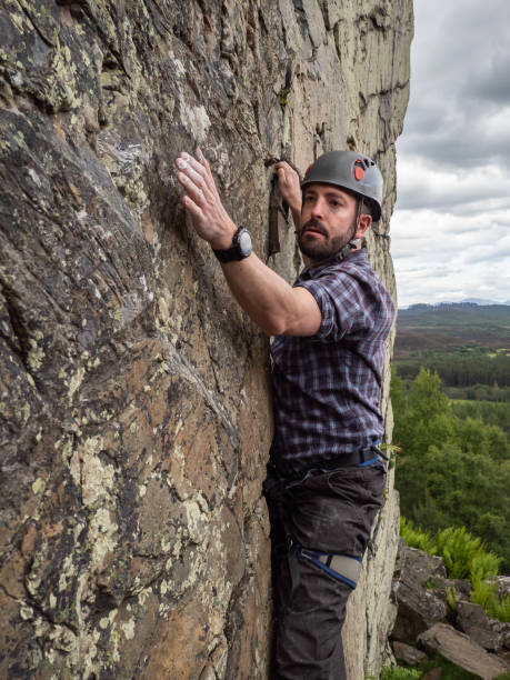 istock Top-rope climbing on Scottish crag 1295651688