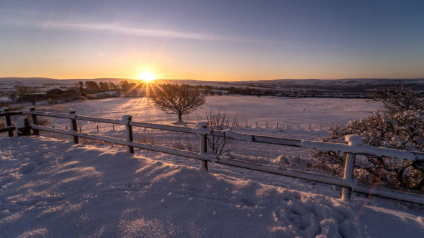 istock Lancashire Winter Sunrise with Sunbeam 1295653119
