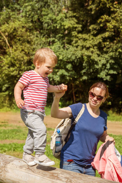 istock Family on walk in park 1295655809