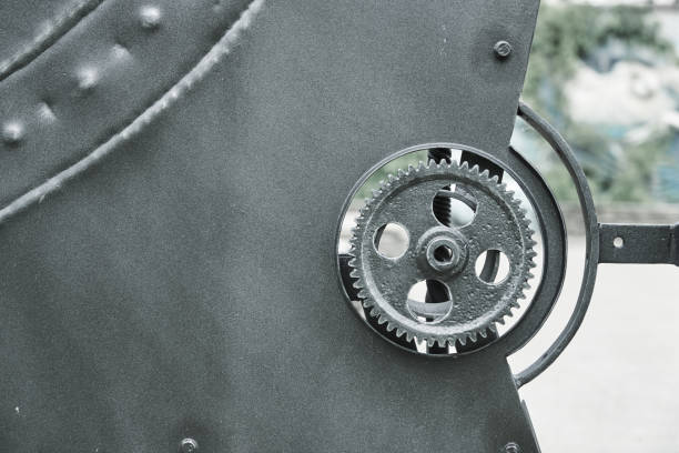 istock Iron mechanical parts and gear wheels. Steampunk texture 1295660346