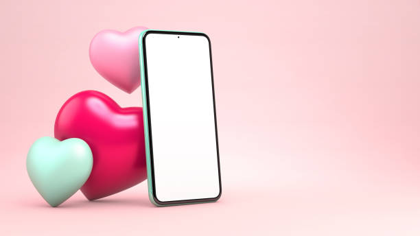 istock 3D rendering mobile phone mockup with hearts for Valentines day big sale template. 3D illustration of smartphone blank screen on a pastel pink background 1295660673