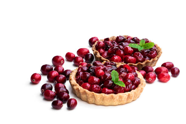 istock Delicious cranberry tarts isolated on white 1295661558
