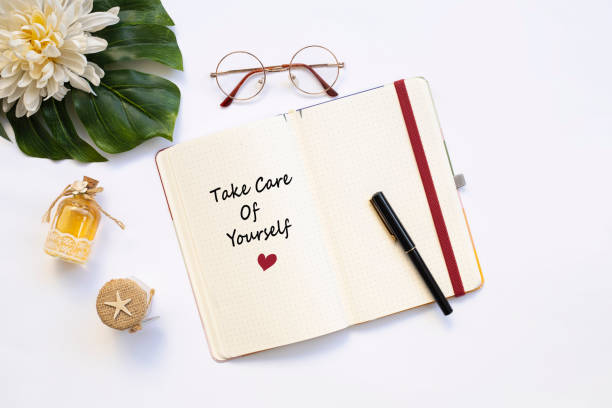 istock Self Care, wellbeing ideas, holistic set of self-care activities concept with open notebook 1295661685