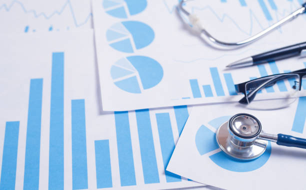 istock Medical charts, stethoscope, pen and eyeglasses. 1295662859