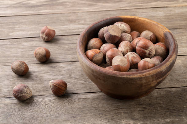 istock A group of hazelnuts in a bowl over wooden table 1295663046