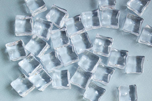 istock artificial ice transparent acrylic pieces not really cold, optical illusion ready to eat on the table outdoor top view copy space for text food background 1295665644