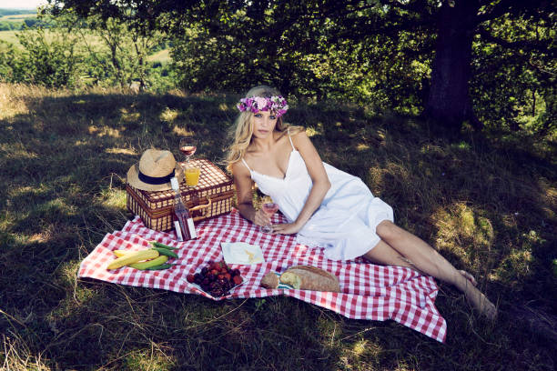istock Sensual woman having picnic 1295667135
