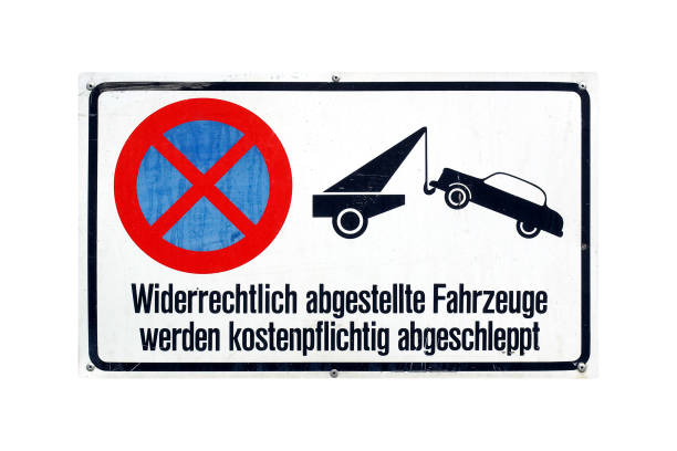 Iturrieta pass. álava province. Spanish basque country. Red warning triangle placed on a snowy road because of a car breakdown