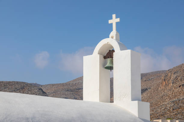 Traditional white chapel, a small church in the center of the small port town on the island of Folegandros, Greece.