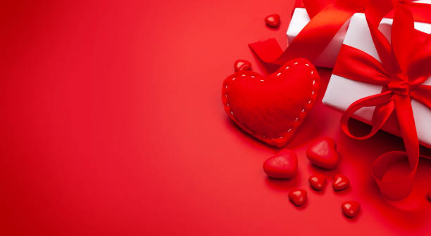 istock Valentines day. Gift boxes, heart decor and candy sweets 1295669948