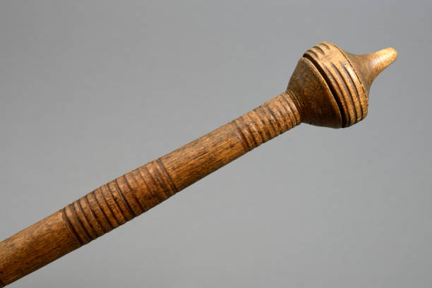 istock old vintage wooden spindle on gray background 1295670303