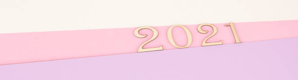 istock The wooden numbers 2021 on a pastel background 1295675077