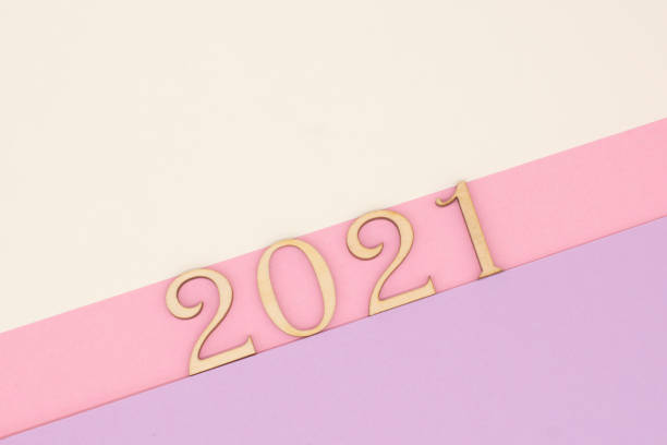 istock The wooden numbers 2021 on a pastel background 1295675080