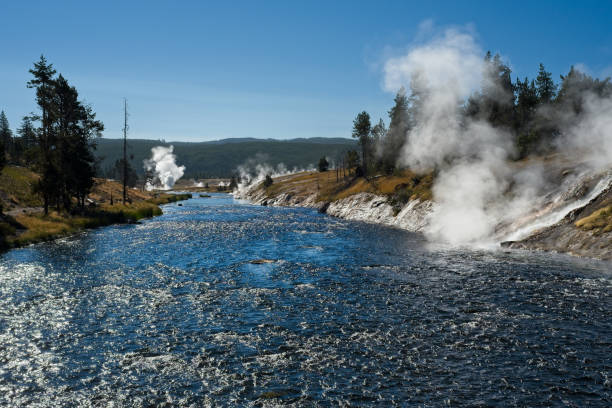 Thermal activity, Yellowstone A variety of thermal activity along the Firehole River in the Midway Geyser Basin of Yellowstone National Park midway geyser basin photos stock pictures, royalty-free photos & images
