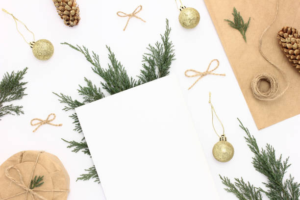 istock Christmas holiday background with a blank paper 1295676204