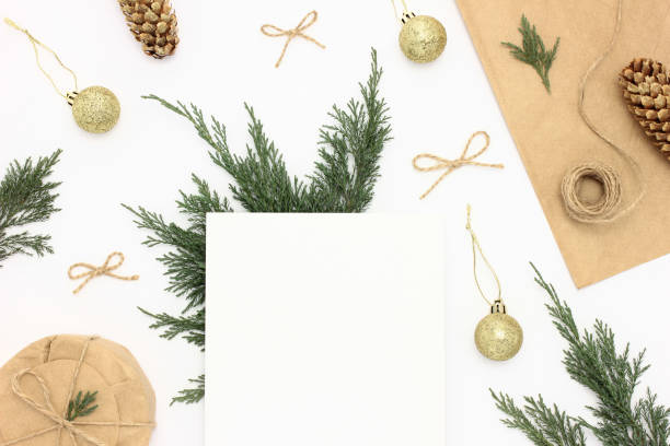 istock Christmas holiday background with a blank paper 1295676286